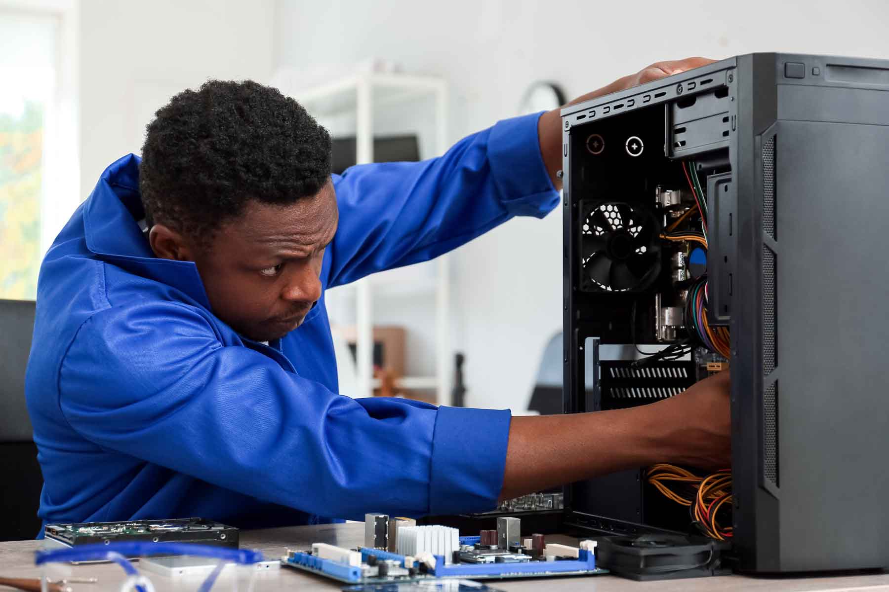 homeguide-computer-repair-tech-fixing-a-PC